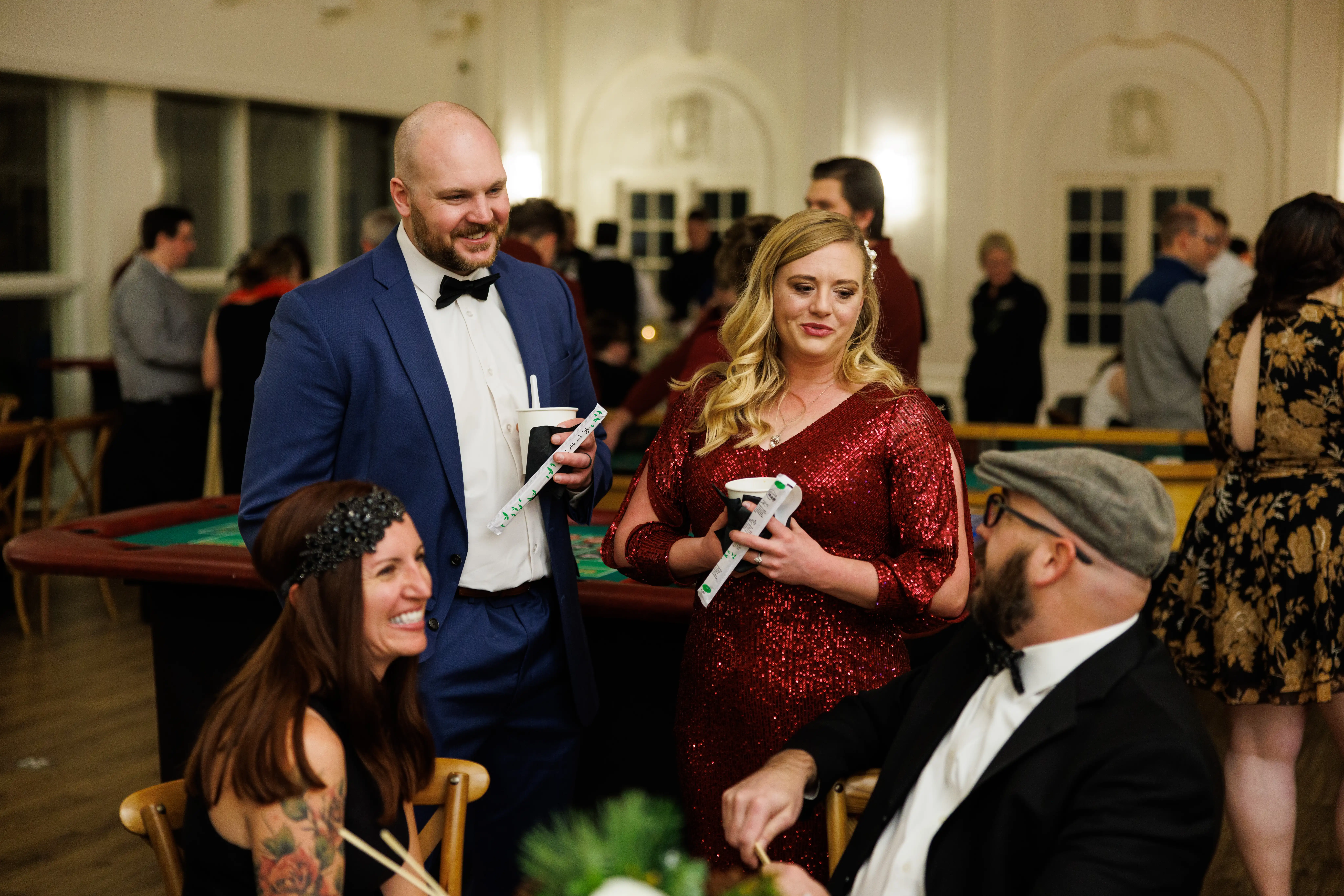 Guests enjoying a social gathering in the ballroom